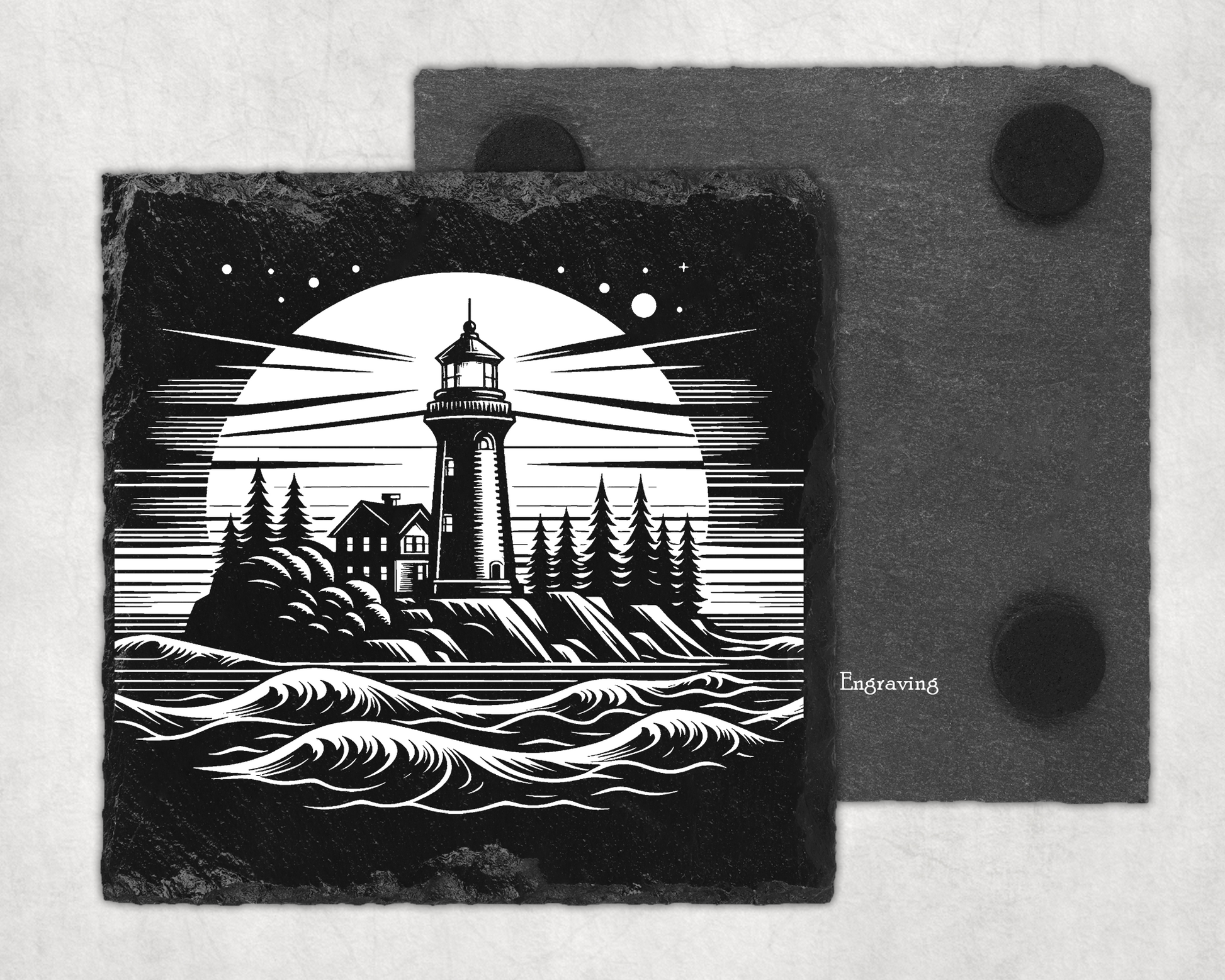 Engraved slate coaster with lighthouse design on a white background